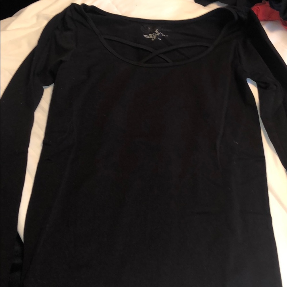Black tight fitted criss cross long sleeve